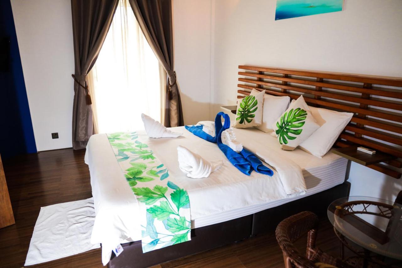 Rasdhoo 棕榈树旅馆酒店 外观 照片