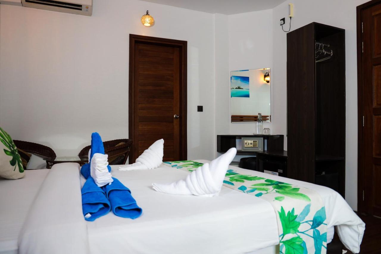 Rasdhoo 棕榈树旅馆酒店 外观 照片
